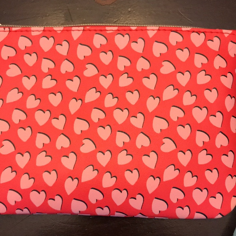 Ipsy make up bag with several trial size make up. - Picture 5 of 5